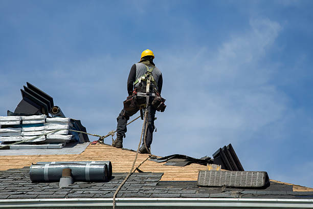 Professional Gutter Installation technician working in Scio, OR